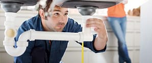 Plumber on work
