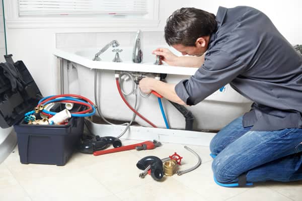 Plumber on work