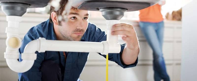 Plumber on work